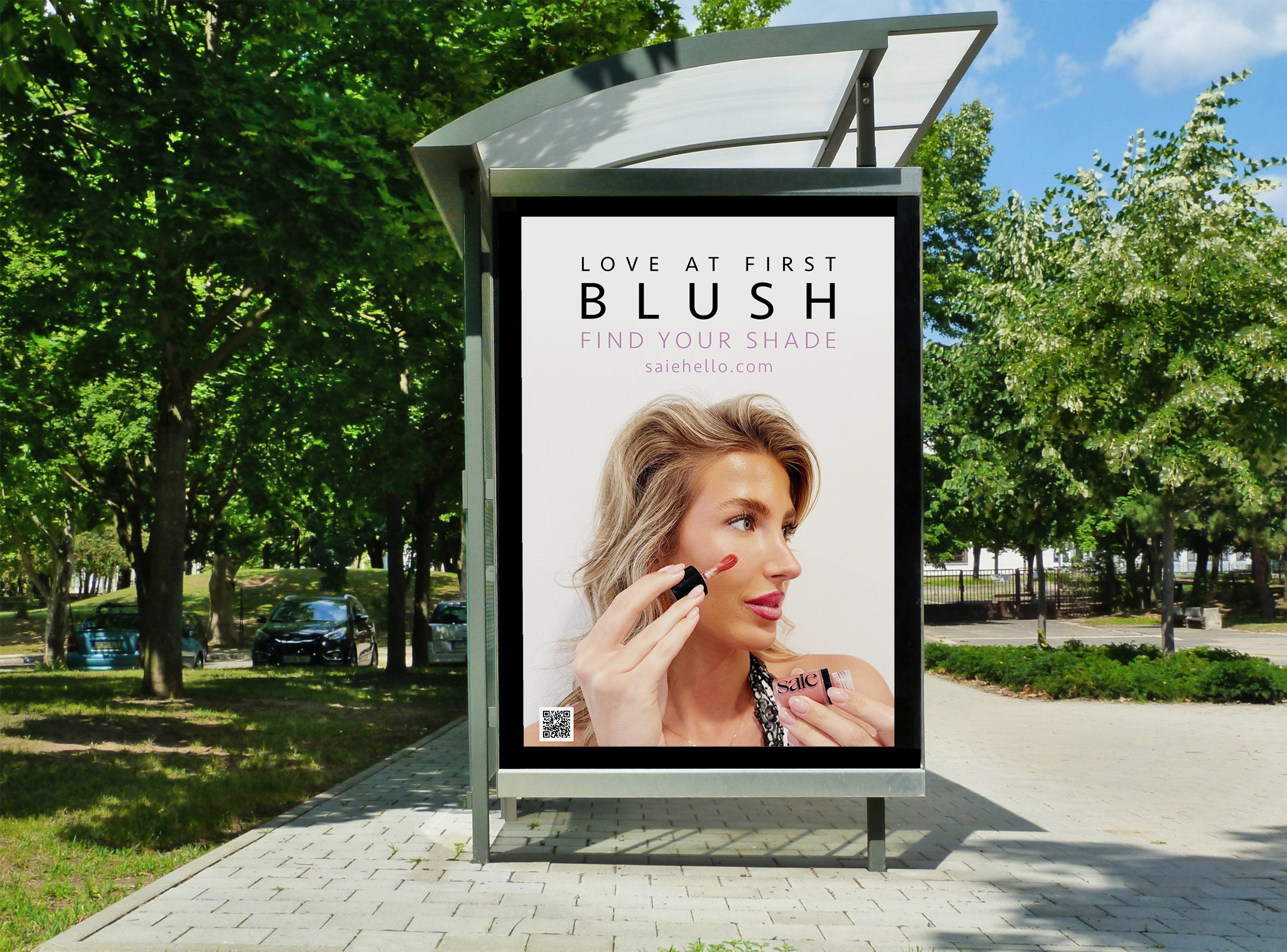 Love at First Blush bus shelter campaign mockup showing a model applying Dew Blush.